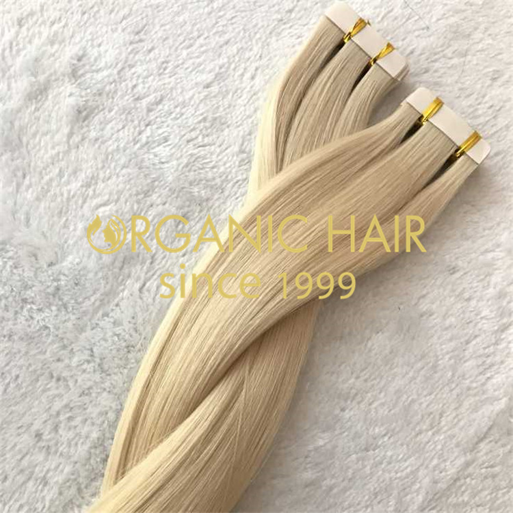 Blonde color hair tape in hair extensions H81